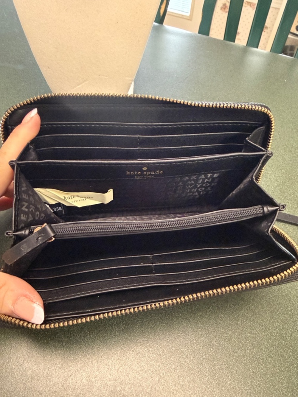 kate spade black pebbled leather zip-around wallet with gold plaque - Picture 7 of 7